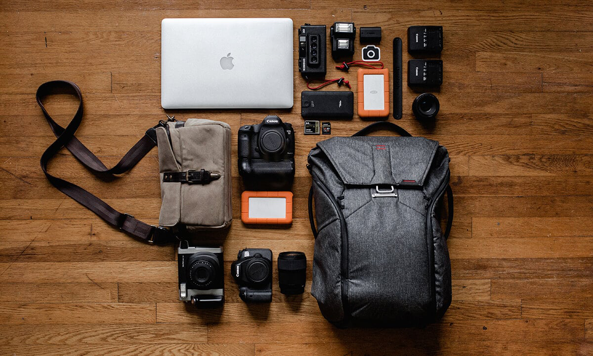 Photography-equipment-laptop-and-backpack.png